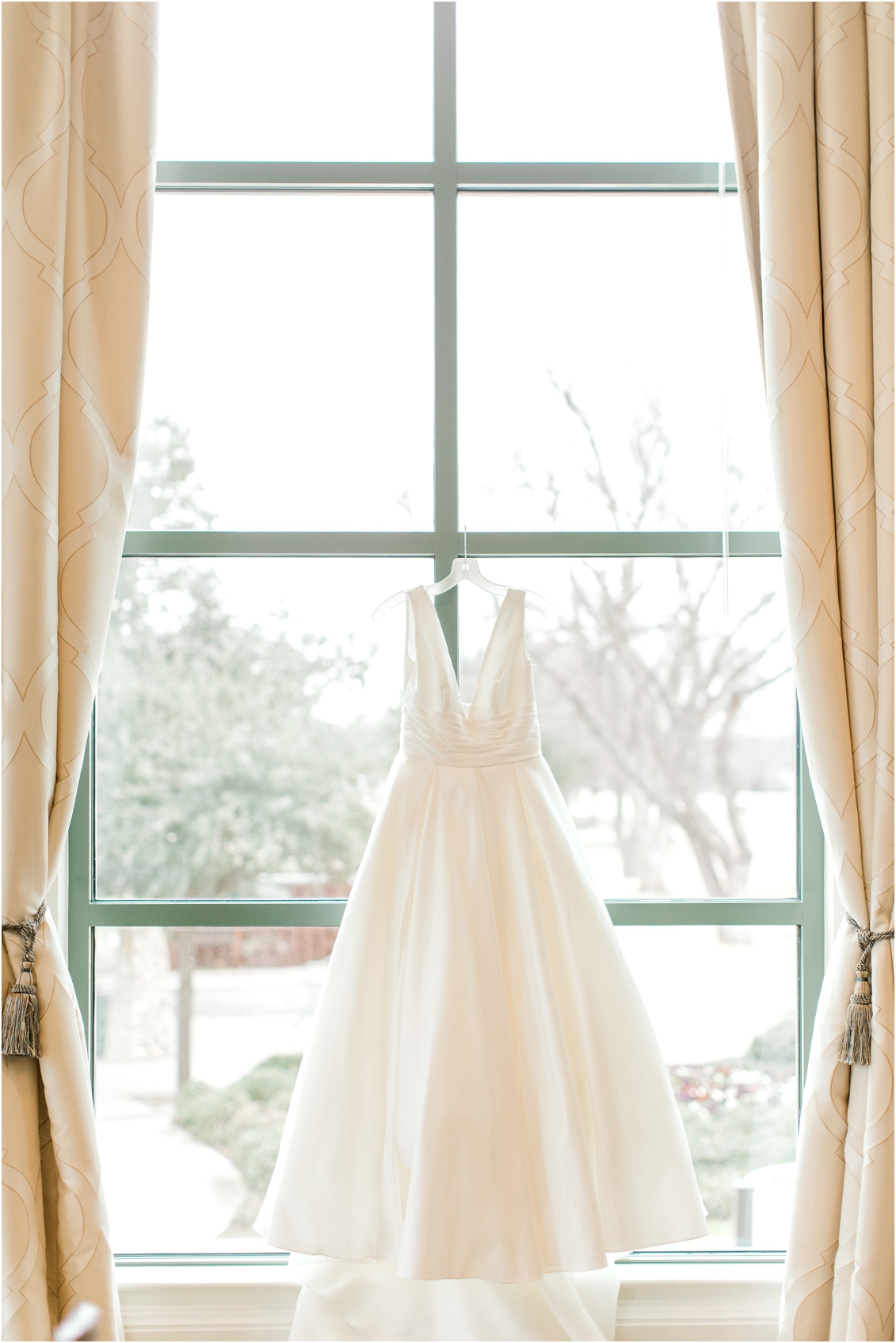 Fort Worth, Texas Wedding at River Crest Country Club by Gaby Caskey Photography, wedding dress hanging photo