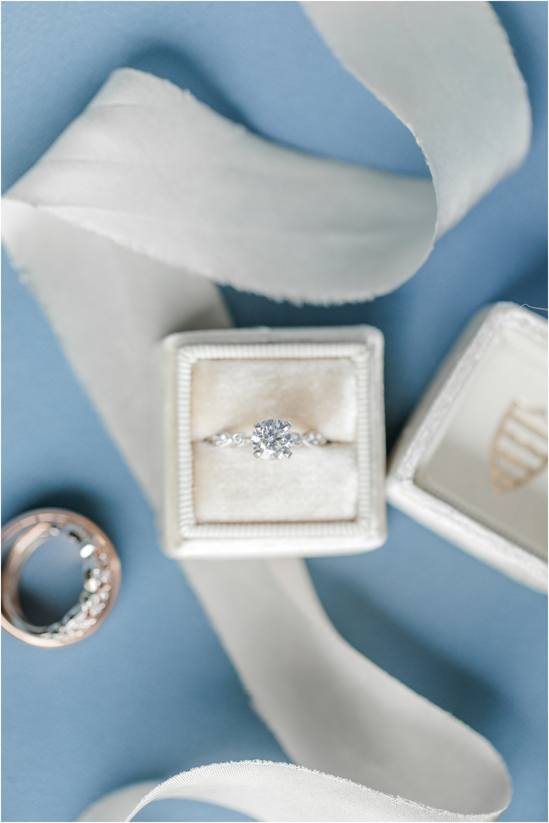 slate blue bridal details by Gaby Caskey Photography, ring shot with Mrs. Box