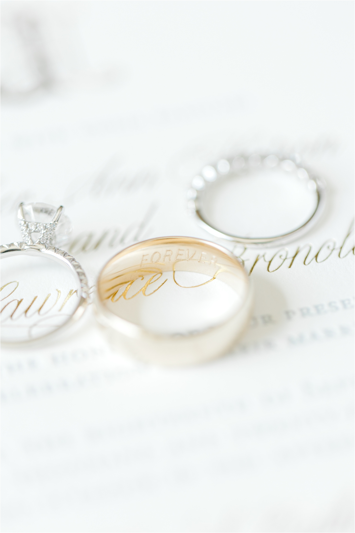 wedding rings, enscribed groom's ring