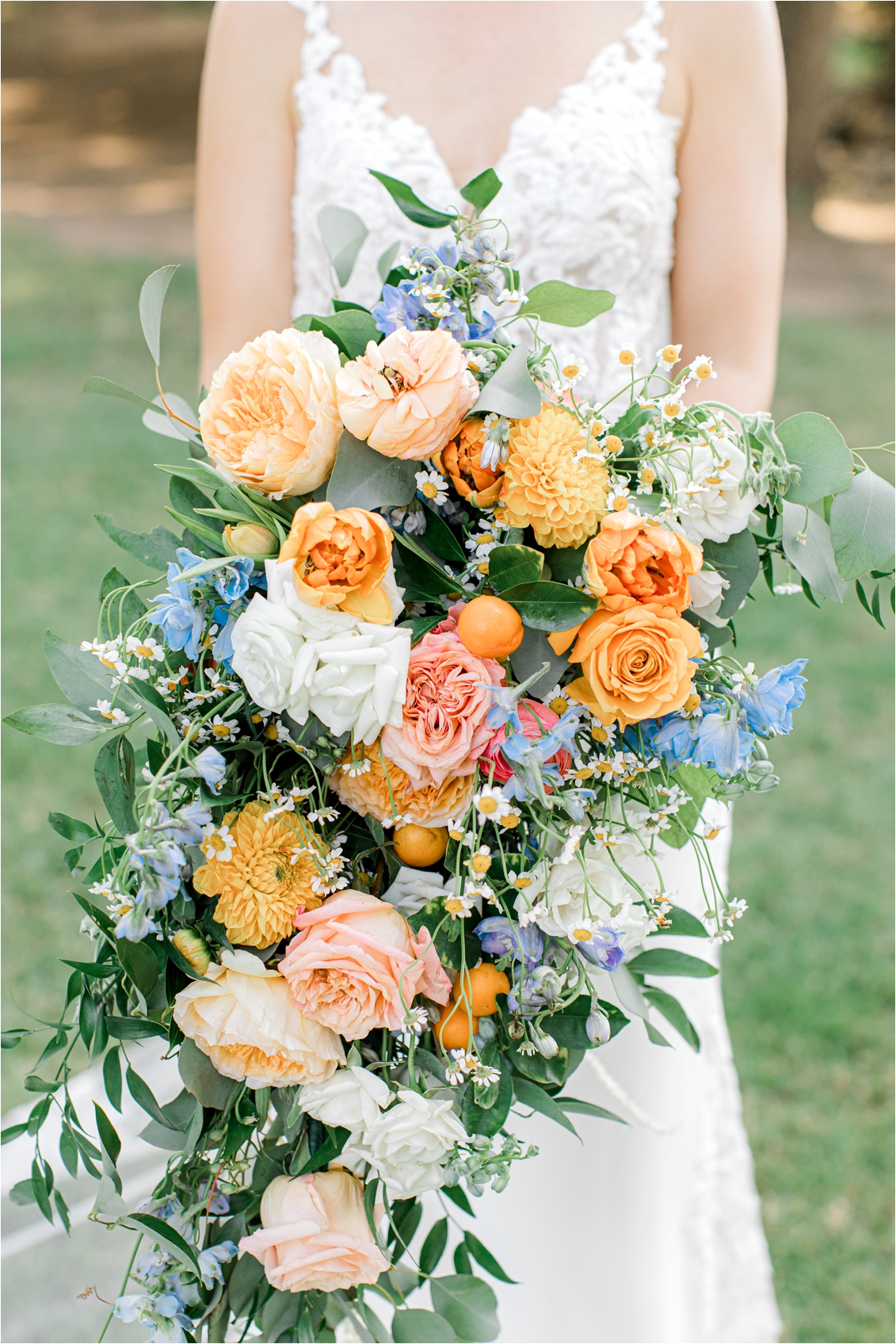 bright and colorful wedding bouquet with citrus accents
